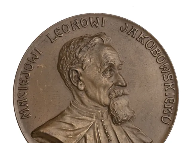 The image shows a bronze medal with a bust of a man with a beard, which is believed to be the Nobel...