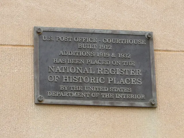 The image shows a plaque on the side of a building that reads "National Register of Historic...