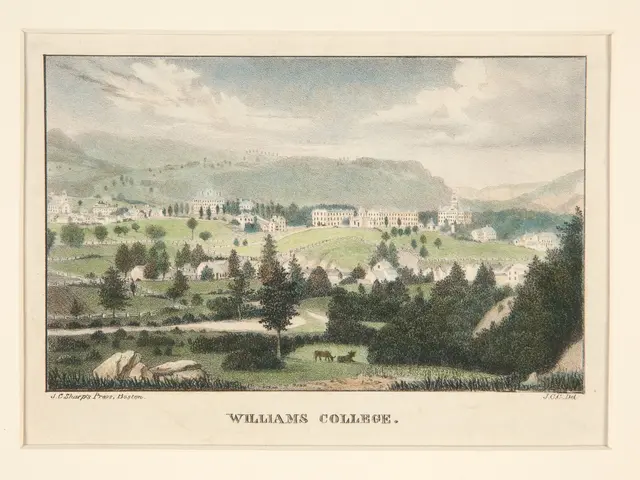 The image shows a view of Williams College from the top of a hill, with trees, buildings, hills,...