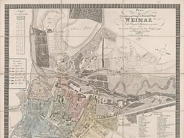 The image shows an old map of the city of Weimar, Germany, with text written on it. The map is...