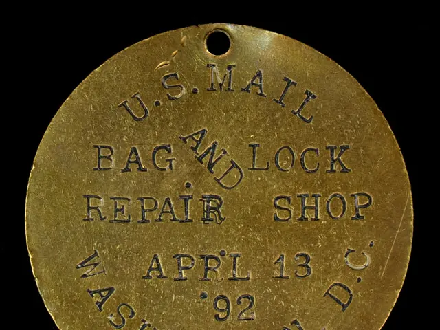 The image shows a gold medal with the words "U.S. Mail Bag and Lock Repair Shop" inscribed on it...