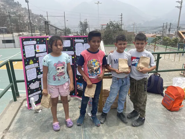The image shows a group of children standing next to each other on a basketball court, each holding...