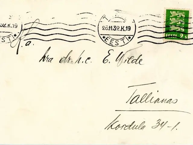 The image shows an old postcard with a green stamp on it, which is an envelope addressed to...