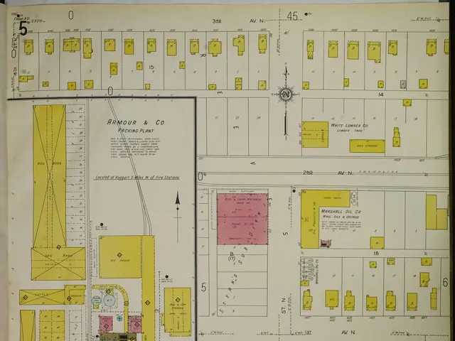 The image shows an open book with a map of a city on it. The map is detailed and shows the various...
