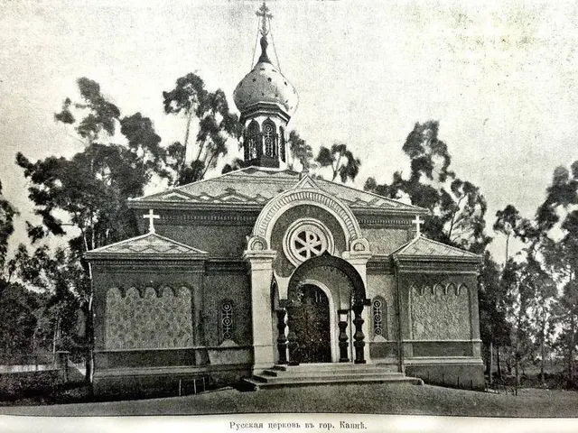 The image shows an old black and white photo of a church with a steeple, surrounded by trees and a...