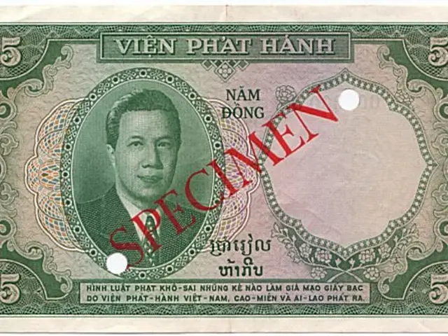 The image shows an old Vietnamese 5 Dong banknote with a picture of a man on it and the words...