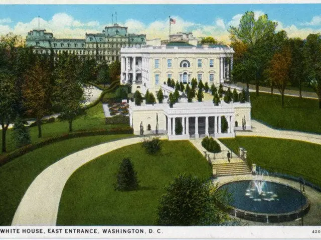 The image shows the White House East Entrance in Washington, DC. It is a large white building with...
