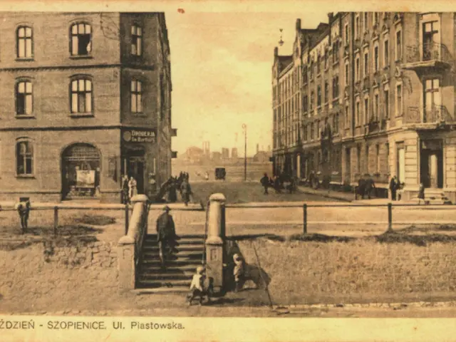 The image shows an old photo of a city street with buildings, people, stairs, poles, and a fence....