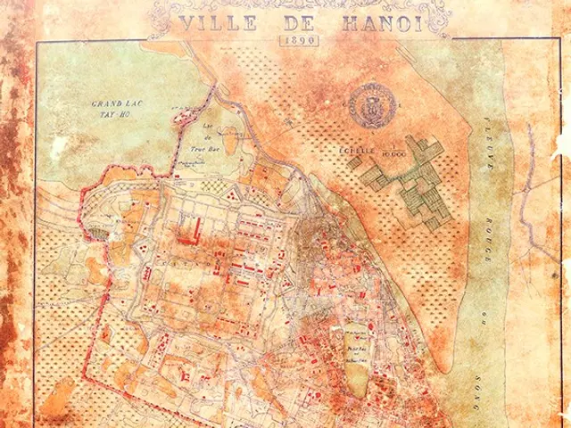 The image shows an old map of the city of Hanoi, Vietnam, with text at the top and bottom of the...
