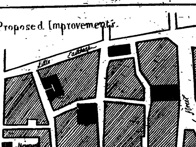 The image shows a black and white drawing of a map of a city with the words "Proposed Improvements"...