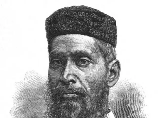 The image shows a black and white portrait of Ram Chandra Bose, the founder of India, wearing a...