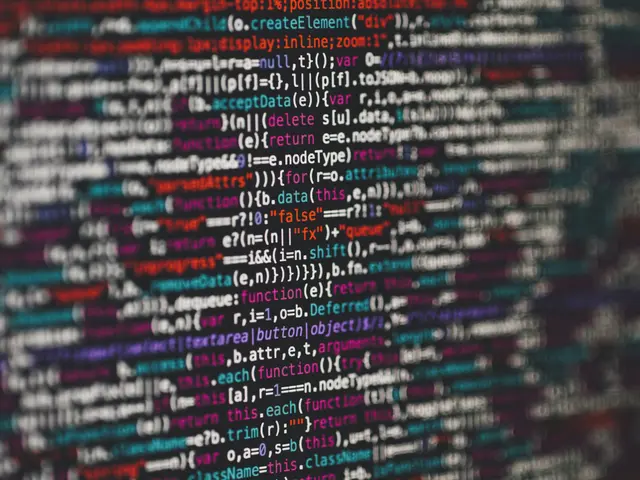 The image shows a computer screen with a multitude of colorful code written on it, providing a...