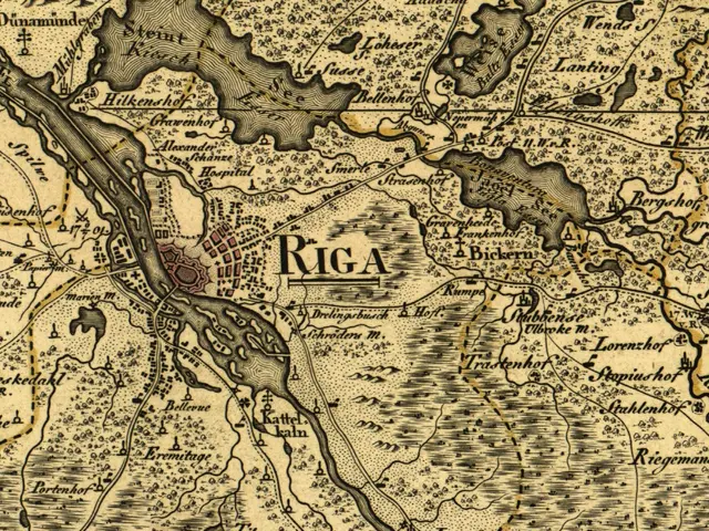 The image shows an old map of the city of Riga, Latvia. It is a detailed map with text written on...
