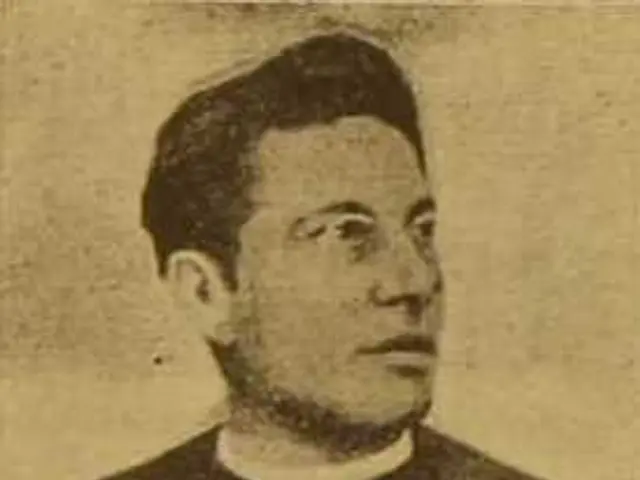 The image shows a black and white photo of a man in a priest's robes, believed to be the first...