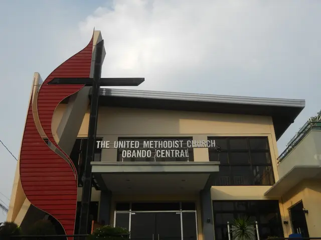The image shows the United Methodist Church in Orlando, Florida. It is a building with glass...