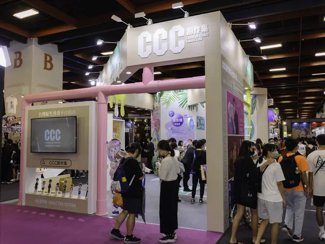 The image shows a group of people standing in front of a booth at a trade show, with some of them...