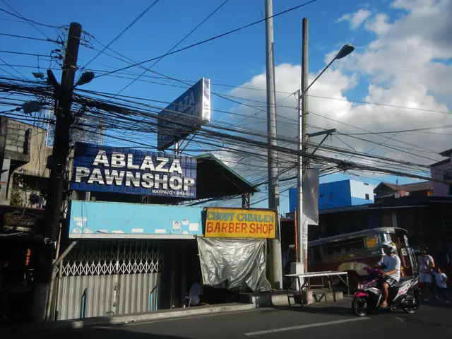 The image shows a bustling street scene in Manila, Philippines, with buildings, electric poles,...