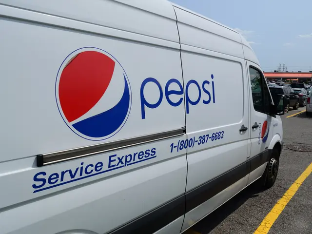 The image shows a Pepsi Service Express van parked in a parking lot surrounded by other vehicles on...
