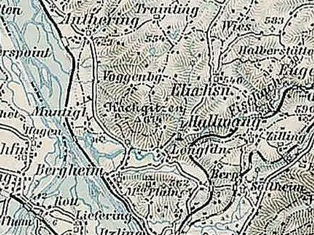 The image shows an old map of the city of Salzburg, Austria, with text written on it. The map is...