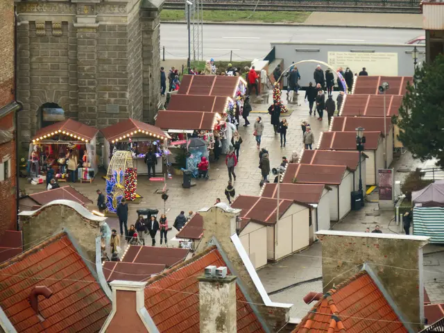 The image shows a bustling city street filled with lots of people walking around, surrounded by...