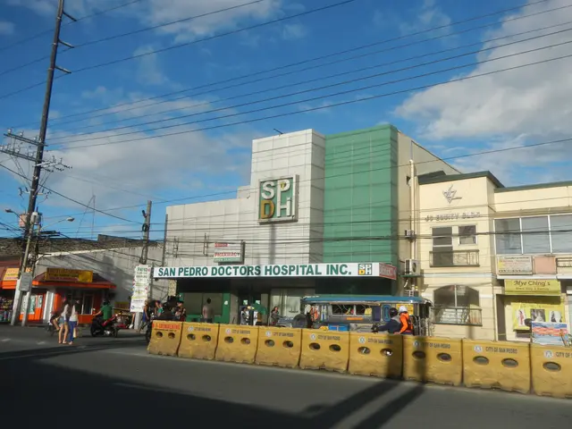 The image shows San Pedro Doctors Hospital, Inc. with buildings, name boards, electric poles,...