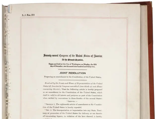 The image shows an open book with a red border on a white background. The text on the book reads...