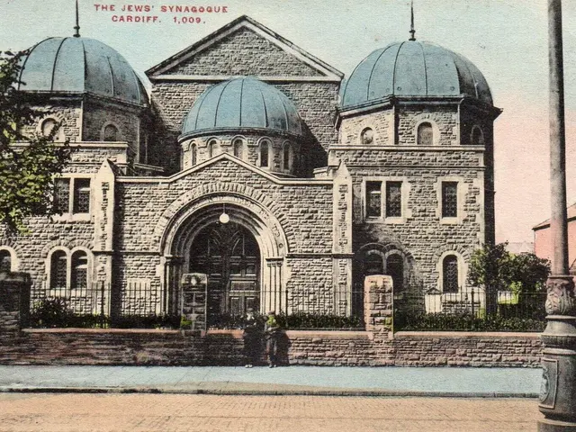 The image shows an old postcard of the Jewish Synagogue in Cardiff, Ontario, Canada. It features a...