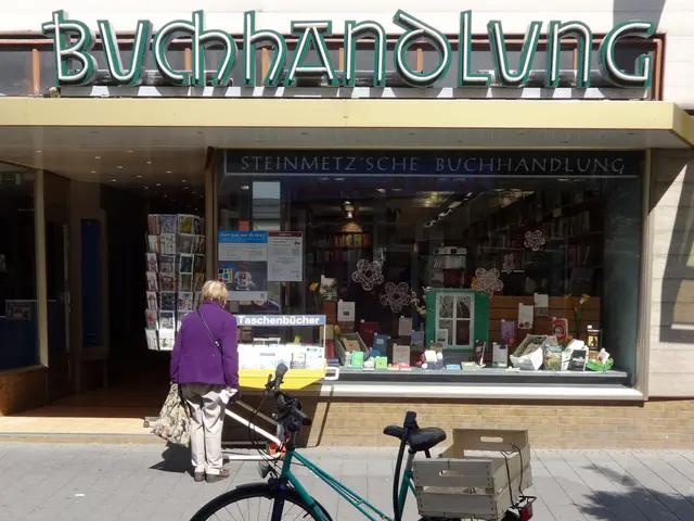 The image shows a woman standing next to a bicycle parked in front of a store. She is wearing a bag...
