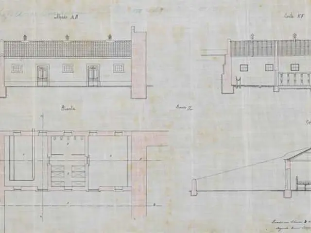 The image shows a drawing of a building with a lot of windows, which is believed to be the site...