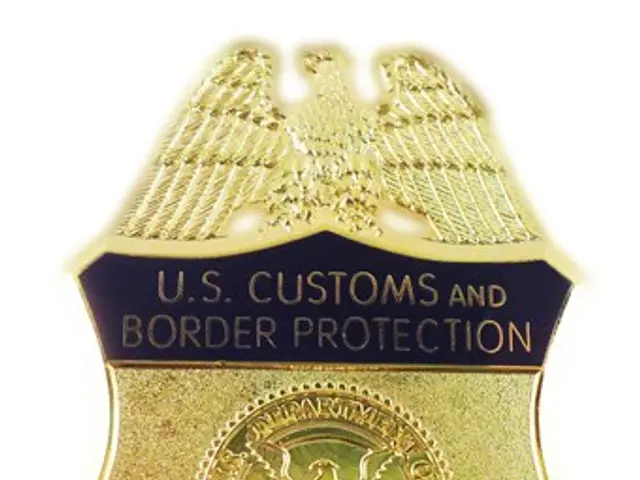 The image shows a gold badge with the words "U.S. Customs and Border Protection Officer" written on...