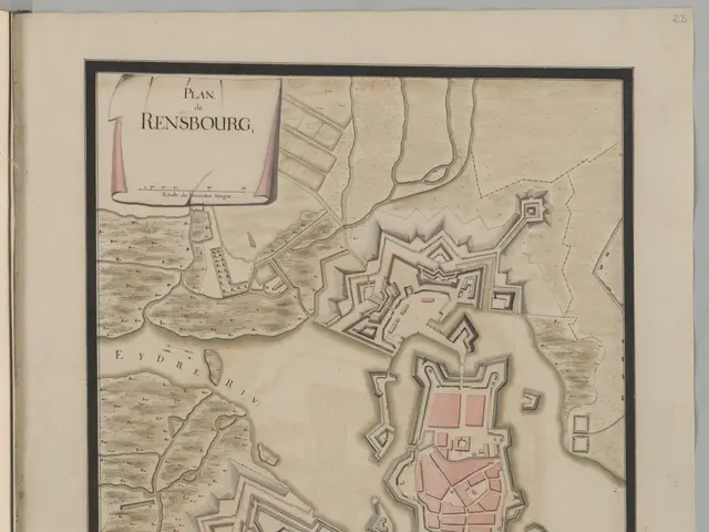 The image shows an old book with a map of the city of Rensburg, Germany. The map is detailed and...