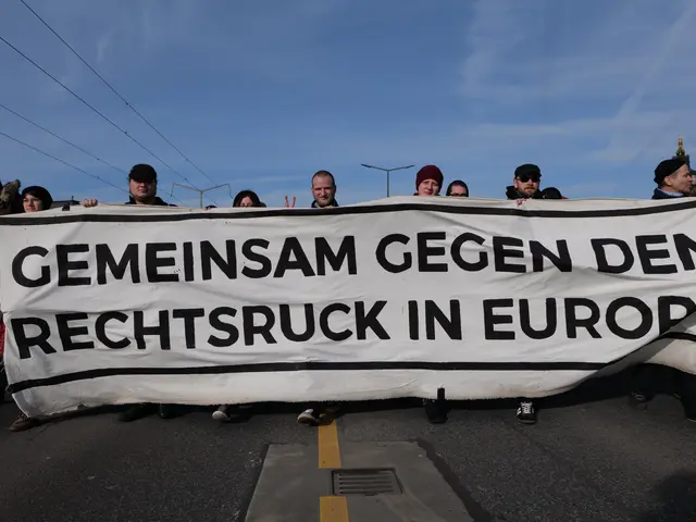 The image shows a group of people standing on the road, holding a banner that reads "Gemensam Gegen...