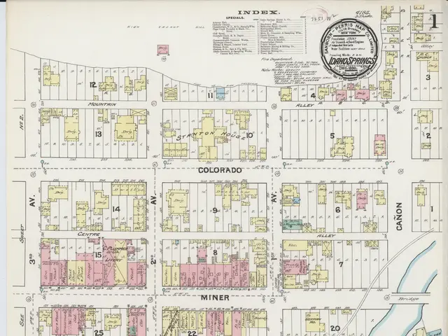 The image shows an old map of the city of Denver, Colorado, with text and a stamp on it. The map is...