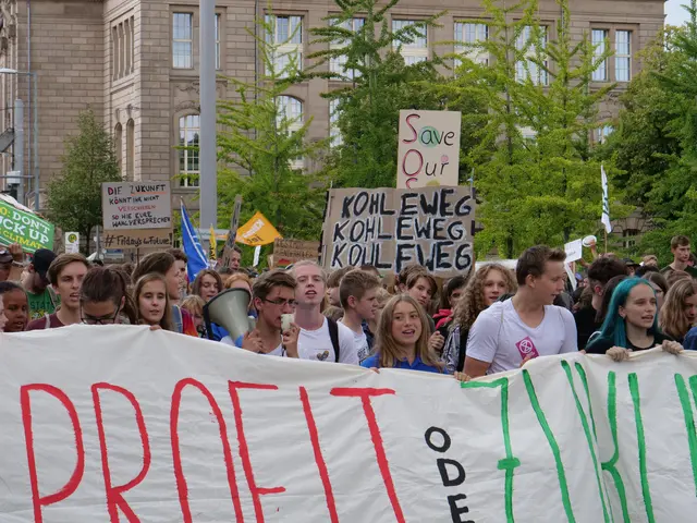 The image shows a group of people holding a banner that reads "Protest in Berlin" in front of a...