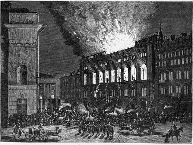 The image shows a black and white drawing of a fire in the middle of a city, with people, horses,...