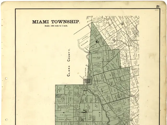 The image shows an old map of the city of Miami, Florida. It is a top view of the map, with text at...