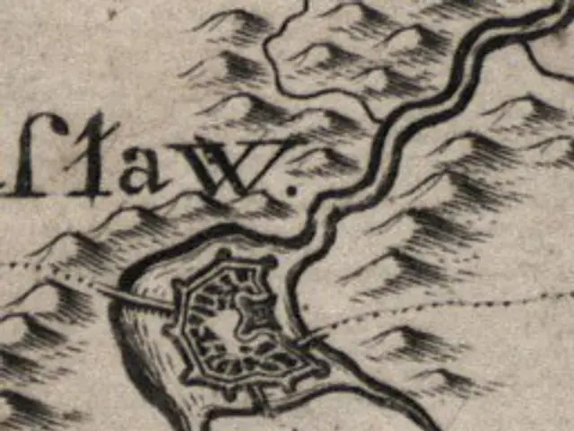 The image shows an old map of the city of Law, with text written on it. The map is detailed,...