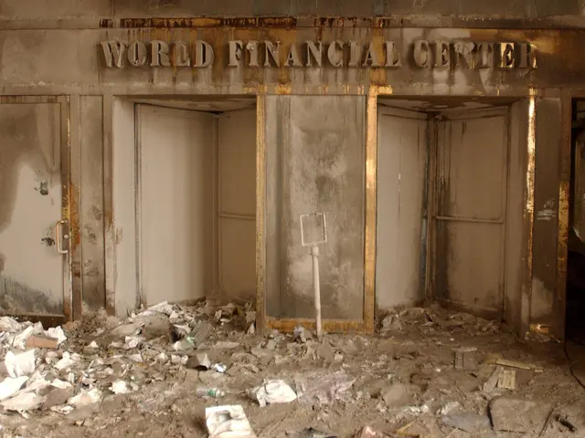 The image shows an old building with a sign that reads "World Financial Center" on the wall. There...