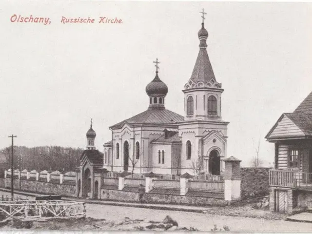 The image shows an old black and white photo of a Russian Orthodox church in Olschany, Russia. The...