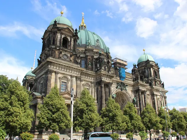 The image shows the Berliner Dom in Berlin, Germany. It is a large building with windows, pillars,...