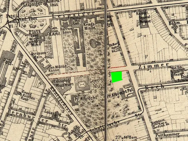 The image shows an old map of the city of Berlin with a green square in the center. The map is...