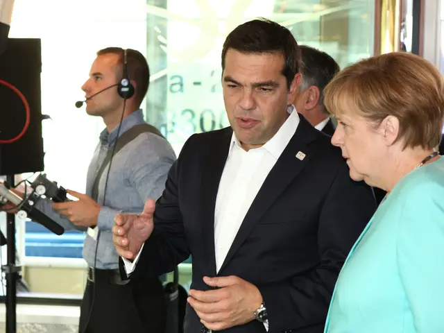 The image shows German Chancellor Angela Merkel and German Chancellor Joachim Gauck standing in...