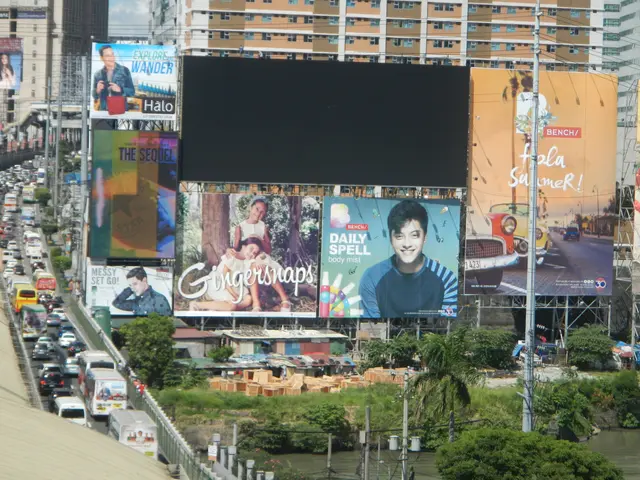 The image shows a city street filled with lots of traffic next to tall buildings, with a large...