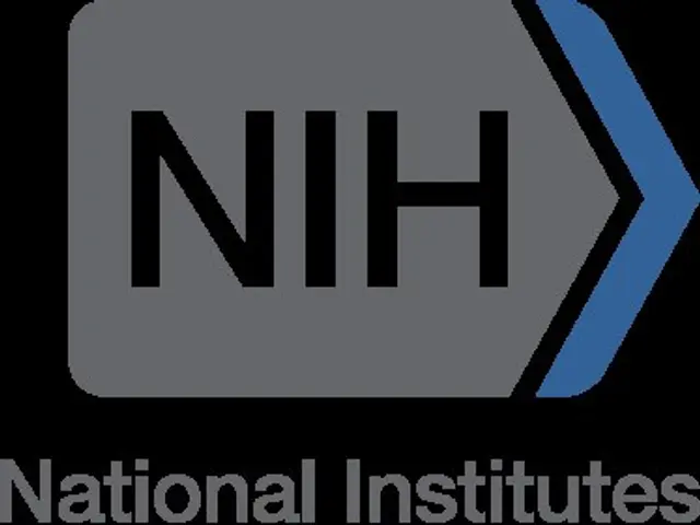 The image shows the National Institutes of Health (NIH) logo, which consists of a blue circle with...