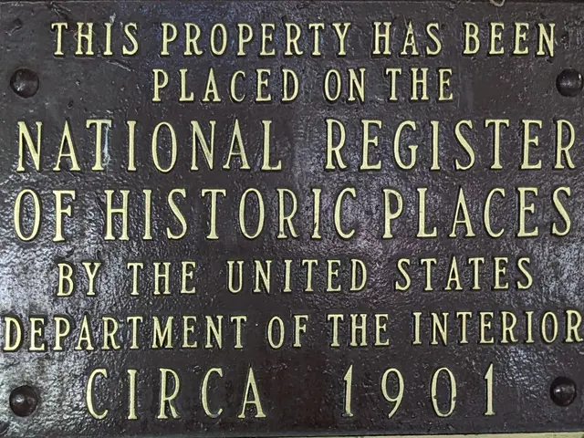 The image shows a plaque on the side of a building that reads "This property has been placed on the...
