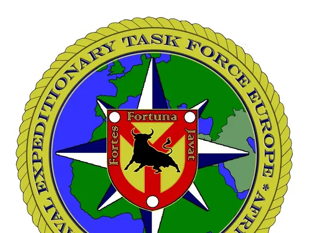The image shows a logo with the text "Naval Expeditionary Task Force Europe" written on it. The...