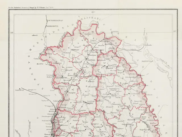 The image shows an old map of the state of Kerala, India, with a border around it. The map is...