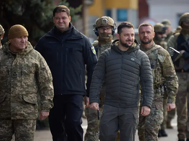 The image shows a group of men in military uniforms walking down a street, with some of them...
