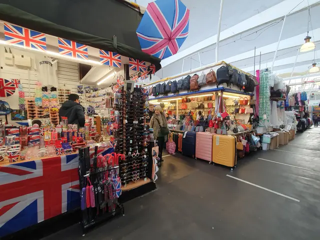 The image shows a store filled with lots of different types of items, including bags, suitcases,...