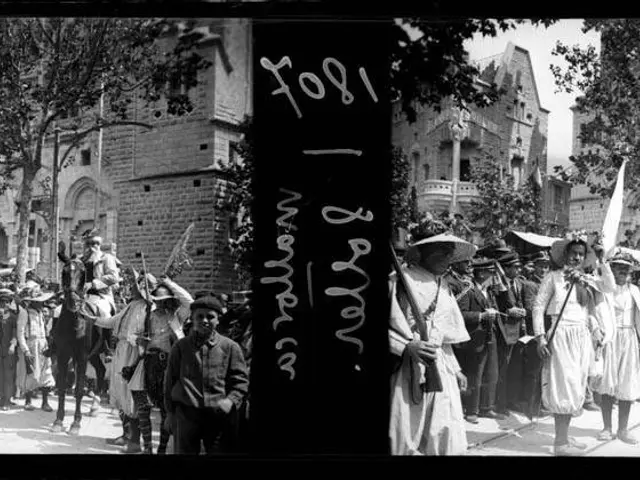 The image shows a group of people standing in front of a building, some of them holding flags and...